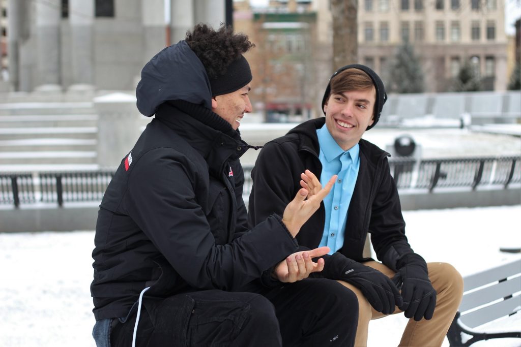 Two people talking.